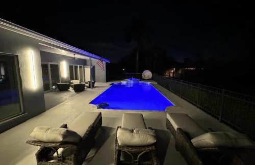 Palm River Estates Casa | Fall in Naples - Game Room pvt pool hot tub impeccable decor