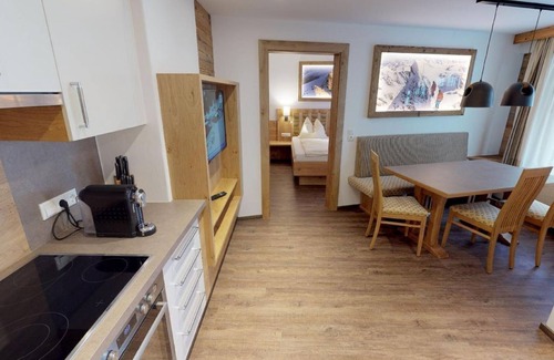 Heiligenblut Cama Y Desayuno | Family apartment - Pension-Appartements Bergkristall