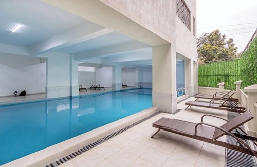 Thompson Estate Apartamento | Family Friendly and Cozy Kilimani apartment with heated pool and kids play area.