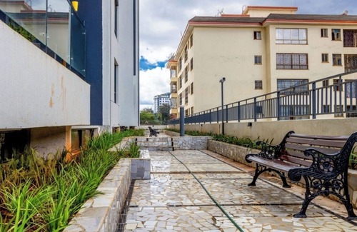 Thompson Estate Apartamento | Family Friendly and Cozy Kilimani apartment with heated pool and kids play area.