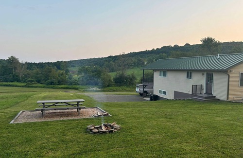 Whitney Point Cabaña | Family friendly cottage, covered deck, close to lake to fish, swim, and boat