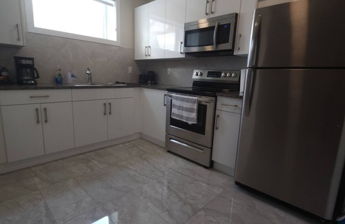 Southwest Edmonton Casa | Family-friendly, clean & affordable 2-BR basement suite close to YEG airport.