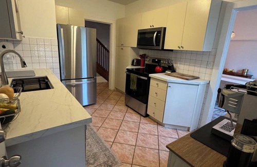Parkdale Casa | Family-friendly fully detached home close to Lakeshore, High Park & Roncesvalles