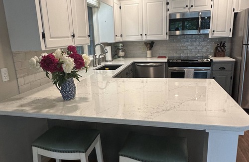 Wolfeboro Casa | Family Friendly house with lakefront views surrounded by trees