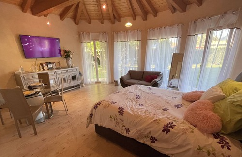 Saxon Condominio | Family garden level