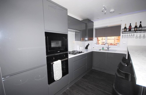 Peacehaven Apartamento | Casa de vacaciones familiar con bañera de hidromasaje para 8 personas
