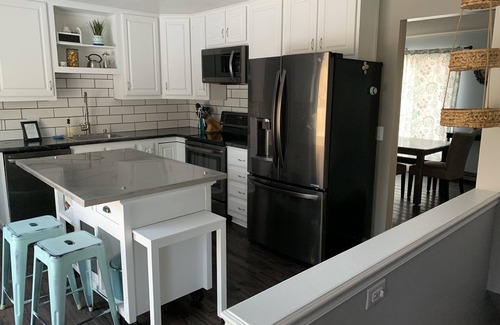Eau Claire Casa | Family home and office with large backyard in the city