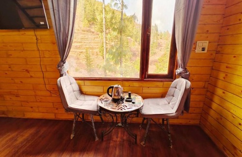 Fagu Cabaña | Family Room with Mountain View - Snowind Cottages