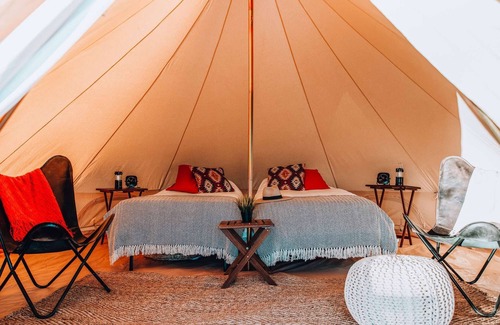 Valle Casa | Family Tent w/ Shared Bathroom - Find us among the juniper trees and open sky.