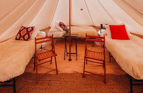 Valle Casa | Family Tent w/ Shared Bathroom - Find us among the juniper trees and open sky.