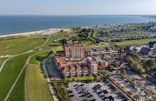 Schillig Apartamento | Family vacation apartment close to the beach on the North Sea with balcony and sea view - Hus