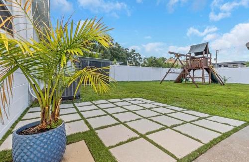 Tampa Villa | FamilyFriendly Tampa Retreat Back Playset