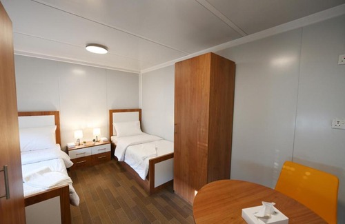 Doha Cama Y Desayuno | Fan Village Cabins Free Zone