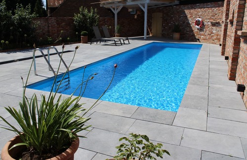 Heeslingen Apartamento | Fantastic accessible vacation apartment with pool, jacuzzi & sauna in country house style