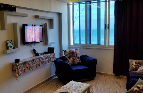 Al-'Amriyah Apartamento | Fantastic condo with sea view