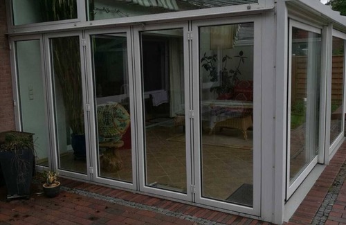 Sandhorst Apartamento | Fantastic apartment with a large winter garden in Aurich