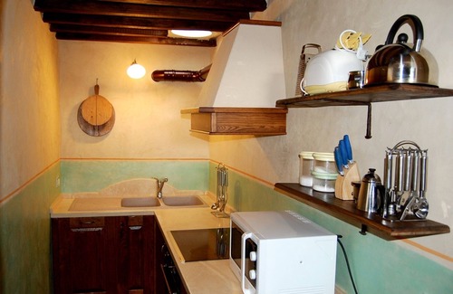 Siena Historical Center Apartamento | GRANJA PODERE CUNINA 25 KM SIENA SUR EN FRENTE MONTALCINO TOMANDO CLASE DE COCINA