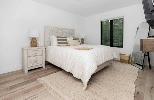 Kemble Casa | Farmhouse chic on Georgian Bluffs, where luxury meets comfort.