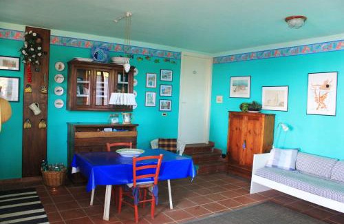 Porto Azzurro Apartamento | Fascinosa casa sul mare in posizione mozzafiato