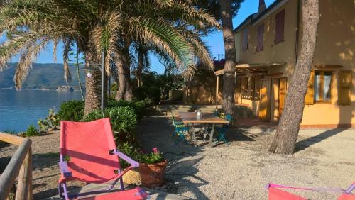 Porto Azzurro Apartamento | Fascinosa casa sul mare in posizione mozzafiato