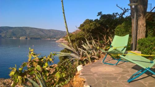 Porto Azzurro Apartamento | Fascinosa casa sul mare in posizione mozzafiato
