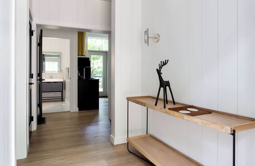 Loudonville Cabina | Fauna Bluff, A cliffside 2-bedroom modern cottage overlooking a bubbling stream.