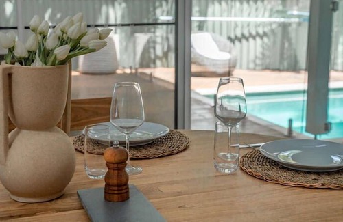 Bateau Bay Casa | Featuring a stunning open-plan living and dining area, this sunny, light-filled, well-appointed, ful