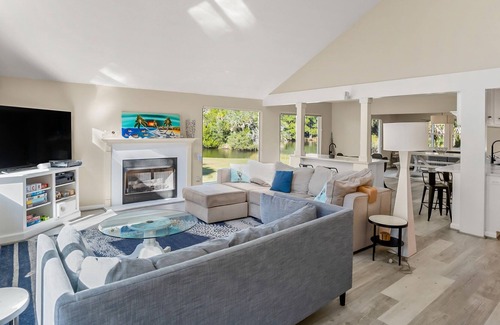 Blue Heron Lake Casa | Fenced backyard w/ pond, fire pit, screened porch, ping pong, Golf cart incl.