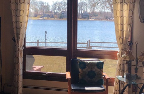 Howell Casa | Fenced in yard! Lovely Mid Century Feel with all Bedrooms facing the Water!