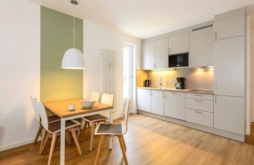 Bensersiel Apartamento | Ferienapartment mit Terrasse Inkl. Freier Nutzung von Saunabereich & Schwimmbad