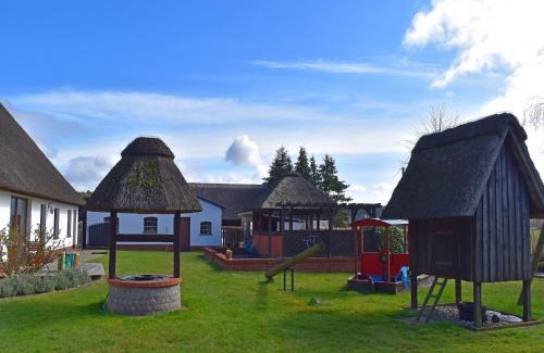 Alt Bukow Apartamento | Ferien unterm Reetdach bis zu 6 Personen