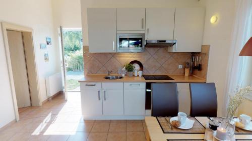 Pelzerhaken Casa | Feriendorf Südstrand Haus 03