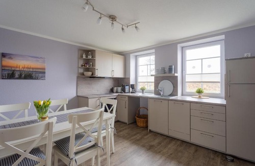 Janneby Apartamento | Ferienhaus Carstensen - gemütlich und rollstuhlfreundlich eingerichtetes Ferienhaus mit Terrasse