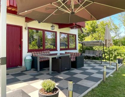 Seepark Kirchheim Casa | Ferienhaus "Gestiefelter Kater" am See im Bergland