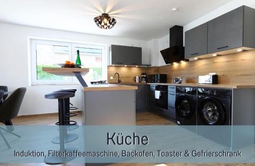 Hockelheim Casa | Ferienhaus Höckelheim- 300qm - 3 Wohnungen - 12 Zimmer - bis 18 Gäste - Kleinkinder reisen gratis - für Familien und Gruppen - Küchen mit Spülmaschine Backofen, Mikrowelle - Smart-TV - WLAN - Fußbodenheizung, Klimaanlage & Raffstores - nähe Göttingen