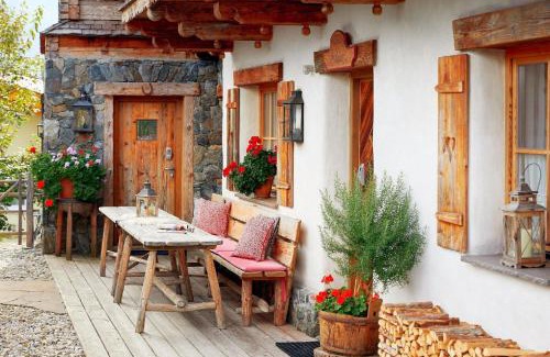 Hundsdorfl Casa | Ferienhaus im Almdorf in Flachau