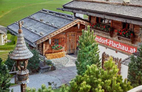 Hundsdorfl Casa | Ferienhaus im Almdorf in Flachau