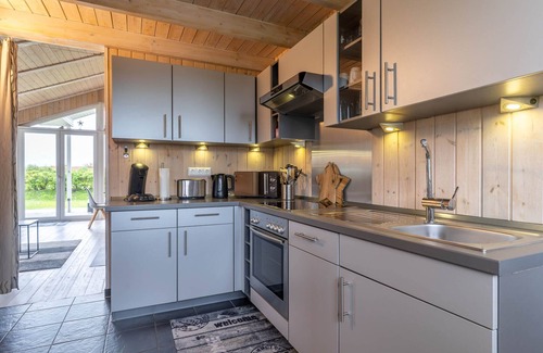 Wesselburenerkoog Casa | Ferienhaus mit Strandkorb, Kaminofen, Whirlpool und Sauna
