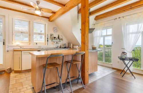 Zudar Casa | Ferienhaus Rügenbrise mit Seeblick direkt am Wasser