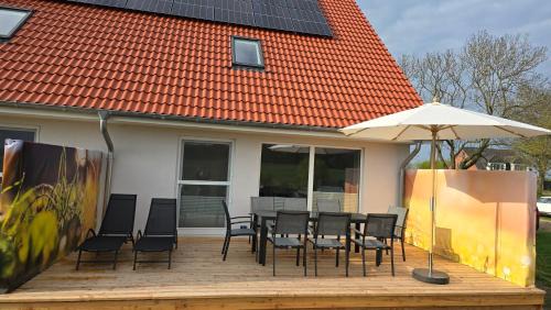 Hohen Schonberg Apartamento | Ferienhaus Südgarten mit Kamin an der Ostsee