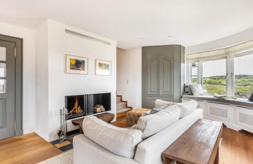 Rantum Casa | Ferienhaus Seehaus Sylt - Urlaubszauber in den Dünen mit fantastischem Meerblick