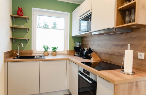 Tannenhausen Casa | Ferienhaushälfte Straßenseite - Küsten Apartments Tannenhausen