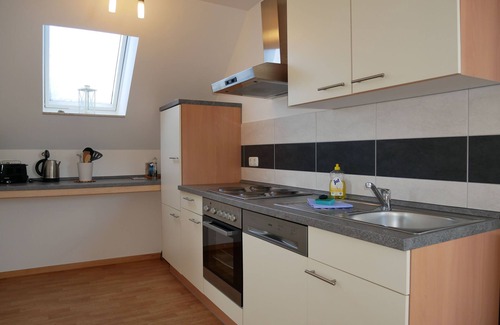 Neppermin Apartamento | Ferienpark Neppermin Ferienhaus Inselblick - Ferienwohnung Inselblick im Obergeschoss