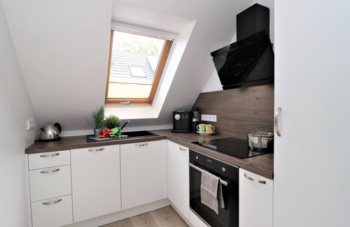 Neuhaus Apartamento | Ferienwohnung mit Terrasse in Strandnaher Lage