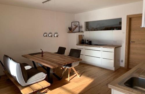 Unterschonau Apartamento | Ferienwohnung Geisberg - Moderne Wohnung mit alpinem Flair in Traumlage