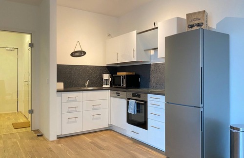 Mitte-Sud Apartamento | Ferienwohnung Bootshaus Am Neuen Hafen