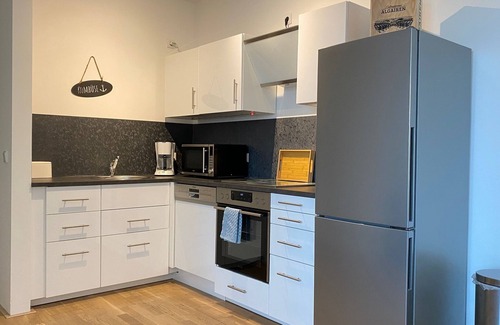 Mitte-Sud Apartamento | Ferienwohnung Bootshaus Am Neuen Hafen