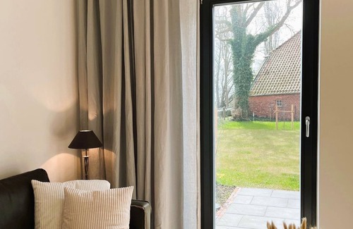 Rysum Apartamento | Ferienwohnung Bütz - Vacation in the historic Gulfhof with modern comfort - Van