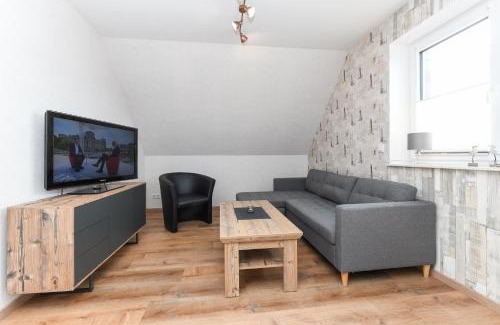 Neuharlingersiel Apartamento | Ferienwohnung im Haus Hafenlicht