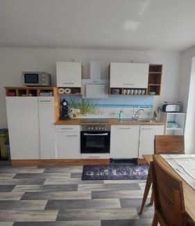 Neuharlingersiel Apartamento | Ferienwohnung Krabbe im Haus-Neuharlingersiel